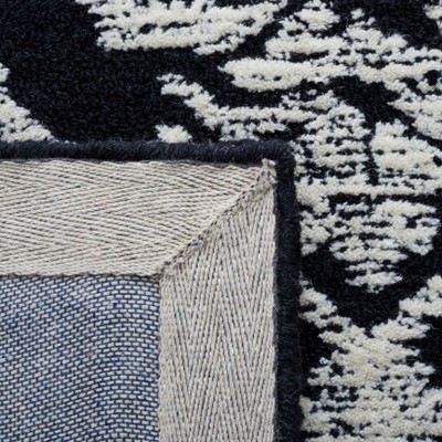 Black and Ivory 6' x 9' Hand-Tufted Wool Area Rug