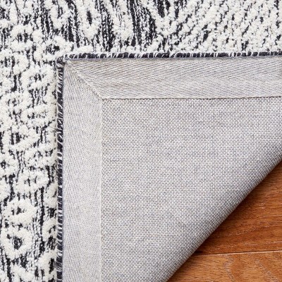 Ivory Round Tufted Handmade Wool Area Rug