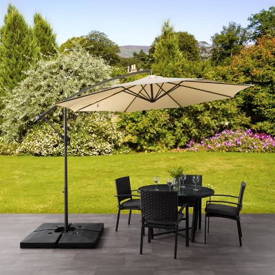 Warm White 9.5' Steel Frame Offset Tilting Patio Umbrella