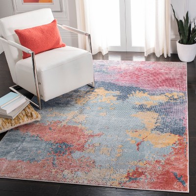 BloomSphere 65" Round Blue Floral Synthetic Area Rug