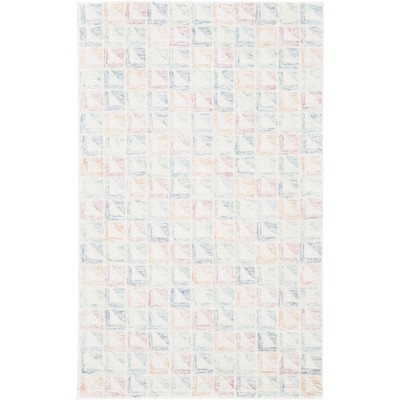 Ivory Coast Chic Hand-Tufted Wool Rectangular Rug