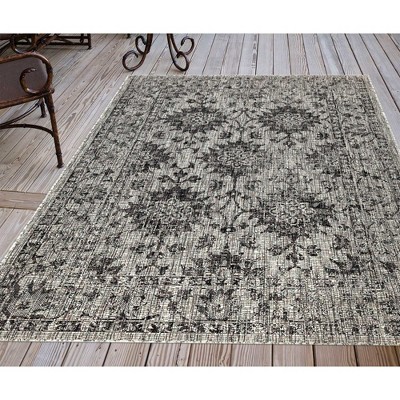 Vintage Floral Black Flatwoven 5' x 7' Synthetic Rug
