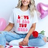 Simply Sage Market Women's Love Is All You Need Smiley Short Sleeve Graphic Tee - 2 of 4