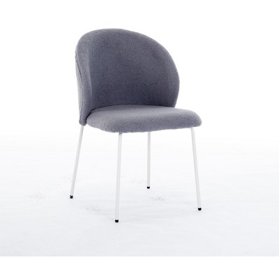 Dexmalle iron-footed dining chair with adjustable foot pads