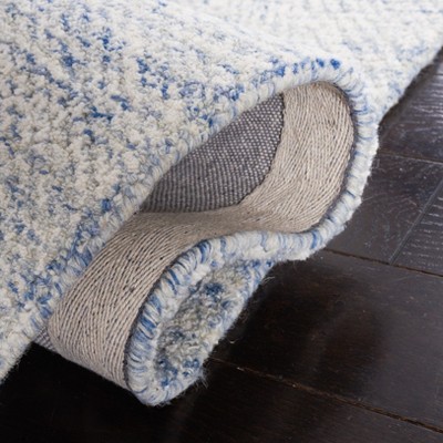 Blue and Ivory Floral Hand-Tufted Wool Area Rug, 5' x 8'