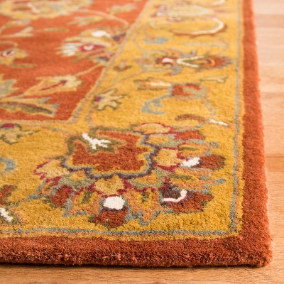 Classic Elegance Hand-Tufted Wool Area Rug in Rich Red, 6' x 9'