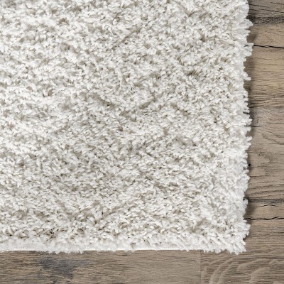 Cozy White Synthetic 8' x 10' Handmade Tufted Shag Rug