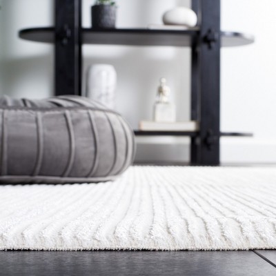 Ivory Hand-Knotted Synthetic Area Rug, 5'3" x 7'6"