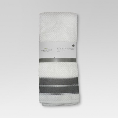 gray and white kitchen towels