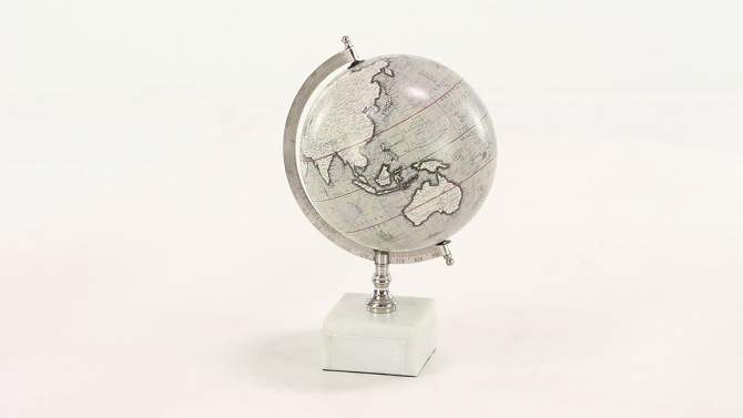 13&#34; x 9&#34; Contemporary Decorative Globe with Iron and Ceramic Stand White - Olivia &#38; May, 2 of 7, play video