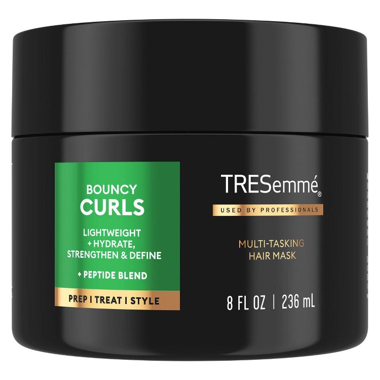 Black jar labeled "Bouncy Curls Multi-Tasking Hair Mask" with 8 fl oz | 236 mL capacity.