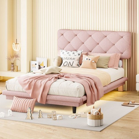 Twin pink deals upholstered bed