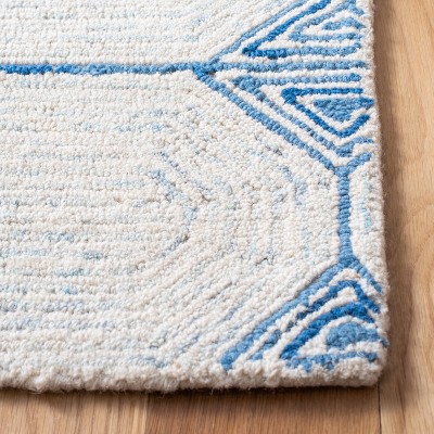 Ivory and Blue Handmade Abstract Wool Rug, 4' x 6'