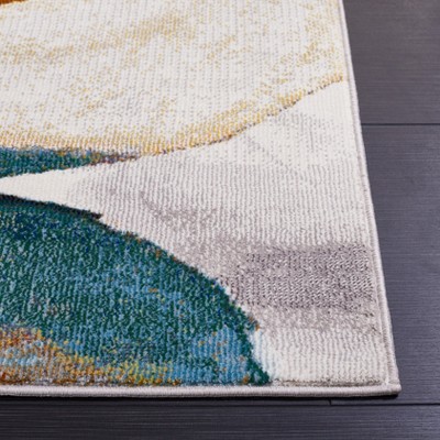 Ivory Abstract Synthetic Rectangular Area Rug, 5'1" x 7'6"