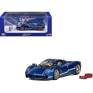 Pagani Utopia Blue Metallic with White Stripes 1/64 Diecast Model Car by CM Model - 1 of 4