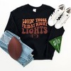 Simply Sage Market Women's Graphic Sweatshirt  Friday Night Lights Football - 3 of 4