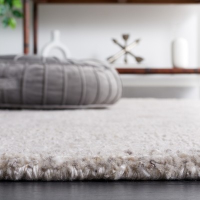 Ivory Abstract Handmade Tufted Wool Area Rug