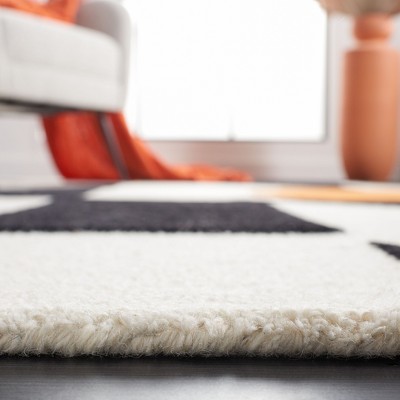 Handmade Black and Rust Geometric Wool Area Rug, 4 ft. x 6 ft.