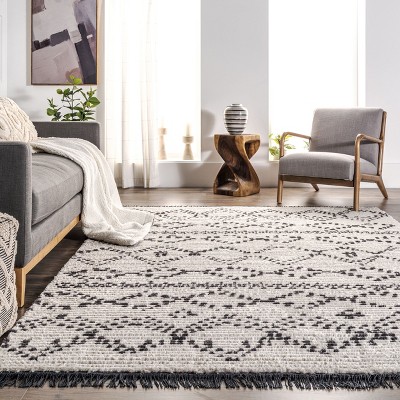 Beige and Ivory 4' x 6' Shag Area Rug with Fringe