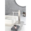 Modern Single-Handle Vanity Faucet with Waterfall Spout for Elegant Bathrooms - 2 of 4