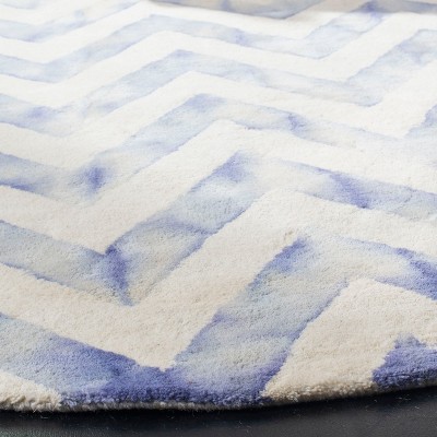 Ivory and Blue Round Hand-Tufted Wool Area Rug