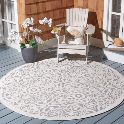 Ivory and Grey Round Geometric Synthetic Indoor/Outdoor Rug