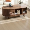 Mshliw 42.5" Oval Fluted Coffee Table with USB, Center Table with Sliding Tambour Doors & Solid Wood Legs for Living Room - 3 of 4