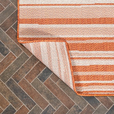 Castara Chic Orange & Cream Striped Synthetic 5x8 Area Rug