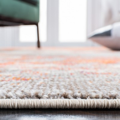 Gray and Orange Abstract 4' x 6' Synthetic Area Rug