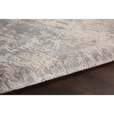 Ivory Abstract Power-Loomed Synthetic 5'3" x 7'3" Area Rug