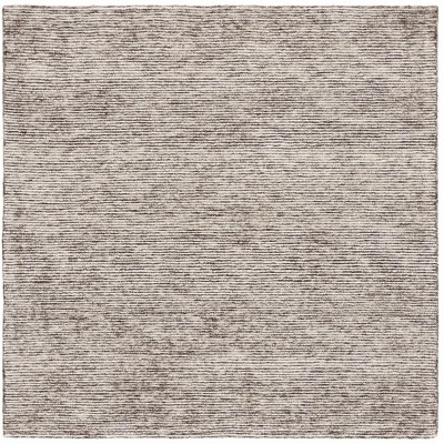 Ebony EBN950 Handmade Tufted Rug - Safavieh