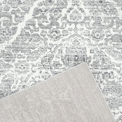 Silver 5' x 7' Distressed Oriental Synthetic Area Rug