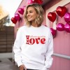 Simply Sage Market Women's Graphic Sweatshirt All You Need Is Love Hearts - 2 of 4