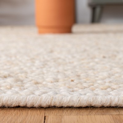 Ivory Handwoven Wool Rectangular 8' x 10' Area Rug