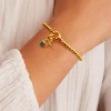Free bird Cross Birthstone Bracelet | Dainty 14K Gold Plated Cross Charm Bracelet | Stretchable Elastic Gold Beaded Bracelet - 4 of 4