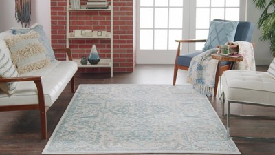 Ivory Blue Floral Synthetic Rectangular 9' x 12' Area Rug