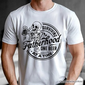 Surviving Fatherhood Skeleton Beer T-Shirt, White Vintage Tee for Tired and Hilarious Dads| OrnamentallyYou - 1 of 4
