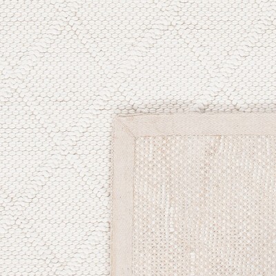 Ivory Hand-Tufted Wool and Viscose 9' x 12' Area Rug