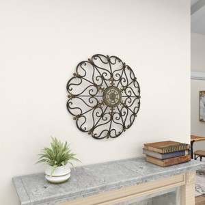 Rustic Round Metal Ornamental Wall Decor Brown - Olivia & May - 1 of 4