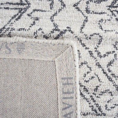 Casablanca 3' x 5' Black and Ivory Wool Hand-Tufted Shag Rug