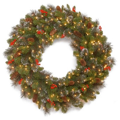 National Tree Company Crestwood Spruce 30 Inch Pre Lit Hanging Christmas Wreath with 200 Branch Tips, 50 White Lights, Pinecones, and Red Berries