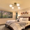 PAKOKULA 29.63 in. 4-Light Gold Modern Sputnik Semi-Flush Mount with White Glass Shade - 4 of 4
