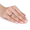 EVERLY JEWELRY | Sterling Silver with Black Rhodium 1/10 CT TW Black and White Diamond Infinity Anniversary Band - 3 of 4