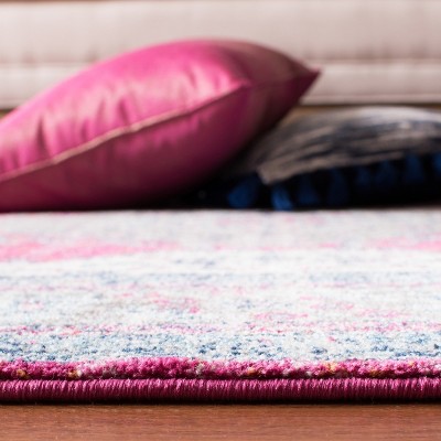 Fuchsia and Navy Synthetic Medallion Area Rug 5'1" x 7'6"