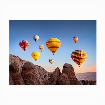 Colorful Hot Air Balloons Over Rocky Landscape Canvas Art