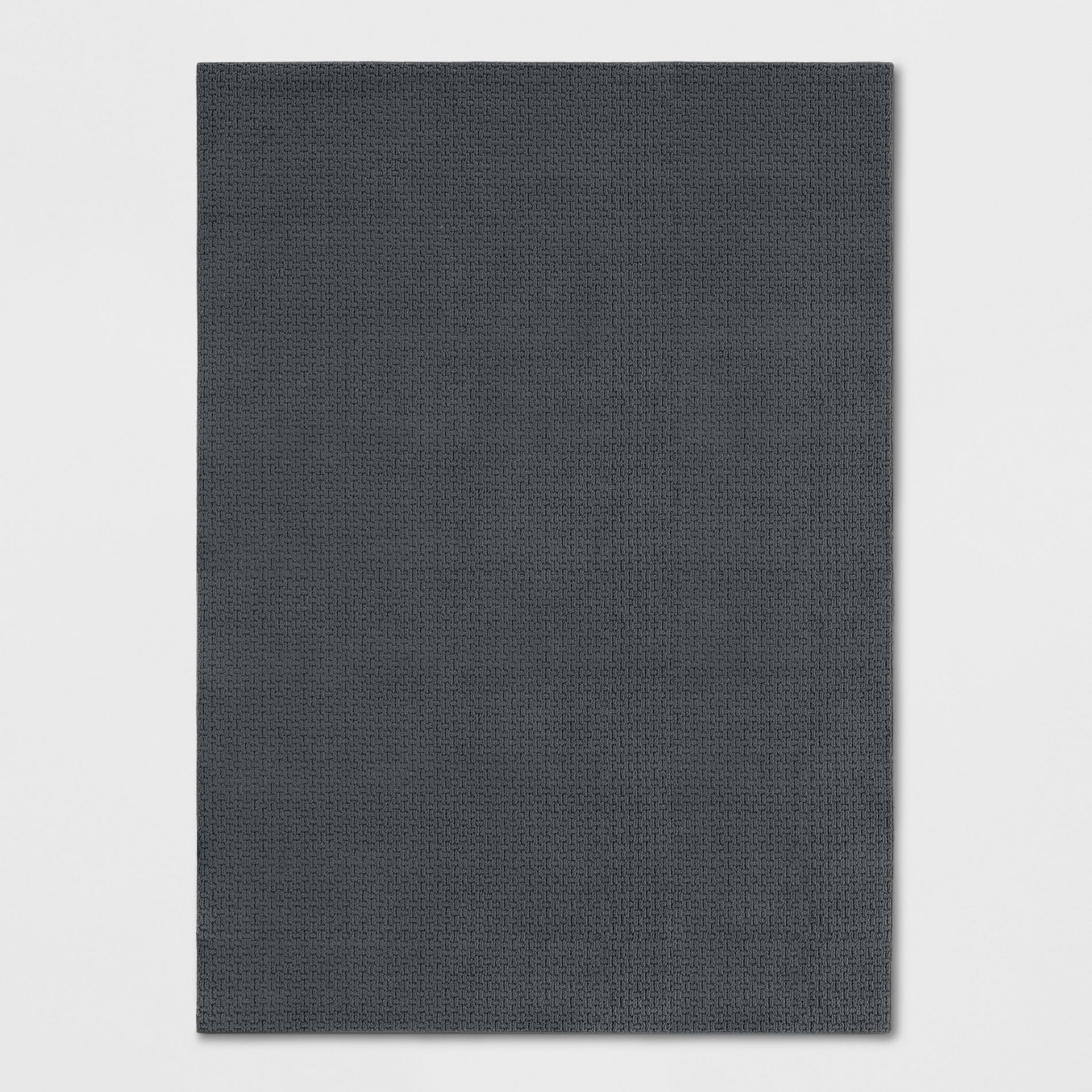 5'x7' Washable Solid Machine Tufted Area Rug Gray - Threshold™