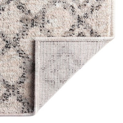 Eco-Friendly Ivory Geometric 4' x 6' Synthetic Area Rug
