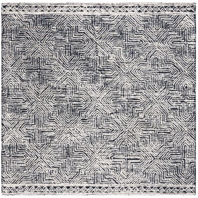 Metro MET480 Tufted Indoor Rug - Safavieh