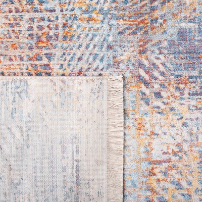 Vintage Blue and Rust Round Synthetic Area Rug