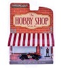 2020 Nissan 370z "NOS Nitrous Oxide Systems" Black with Graphics and Race Car Driver 1/64 Diecast Model Car by Greenlight - 3 of 3